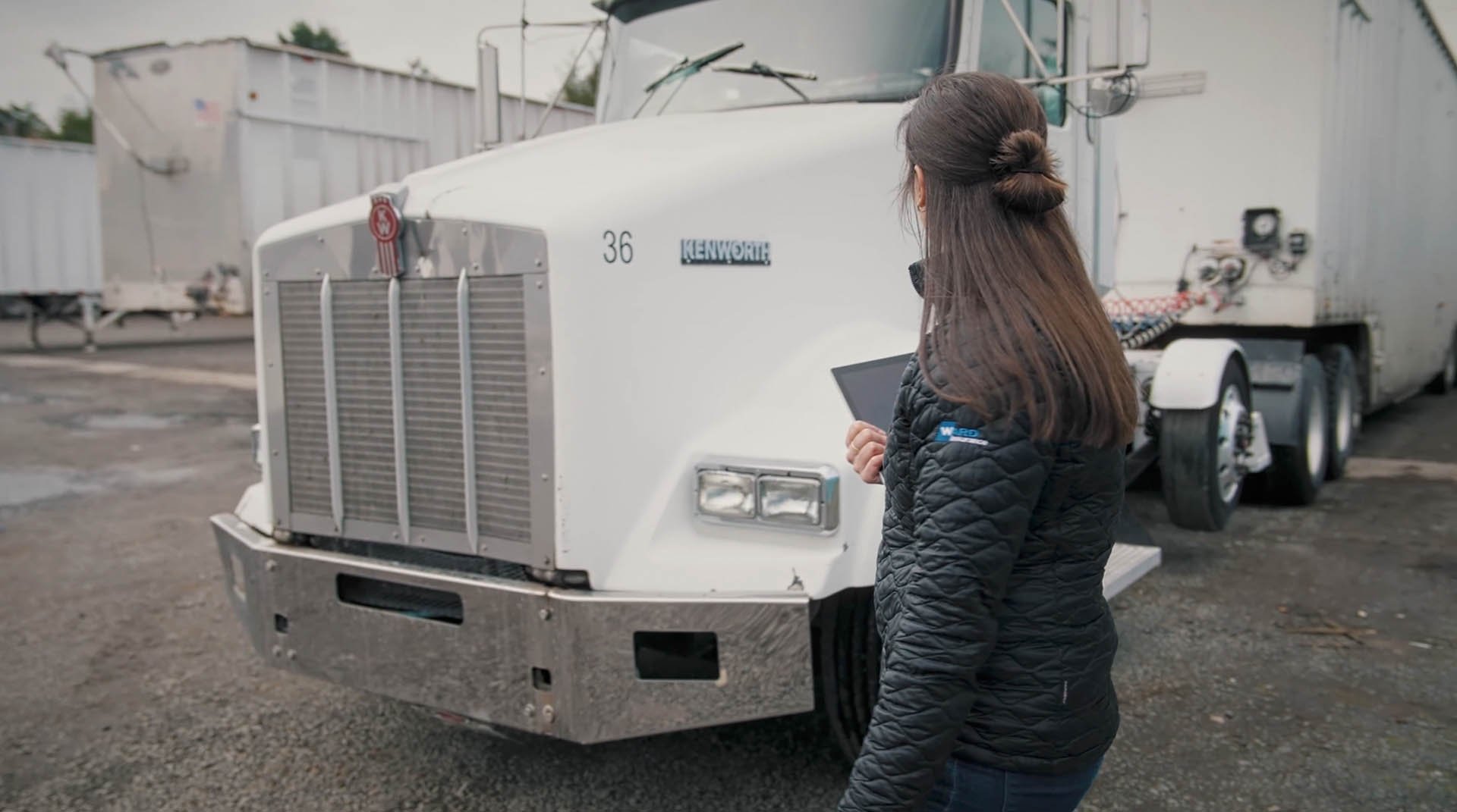 HUB Team Haugen advisor inspecting equipment on site
