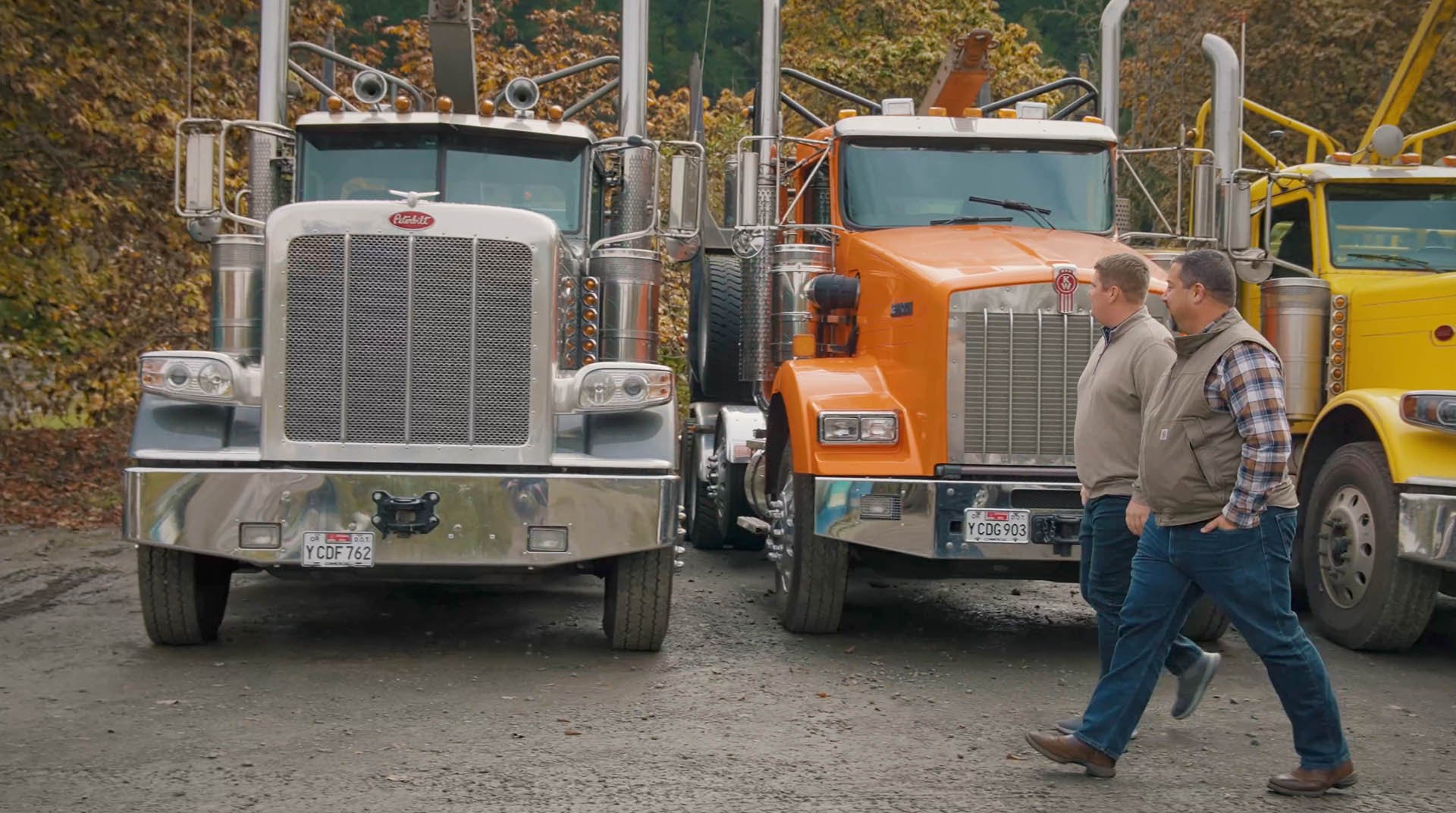 HUB Team Haugen advisors walking a client's heavy truck yard